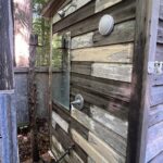 Outdoor shower. Tiny house.