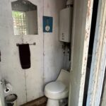 Tiny house outdoor bathroom.