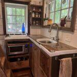 Refinishing tiny house kitchen counter concrete.