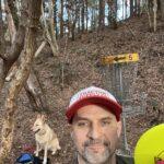 Mark Cool playing disc golf with Daisy 